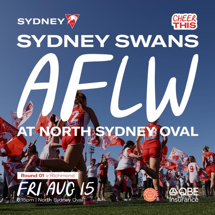 AFLW players coming out on field being cheered on by spectators