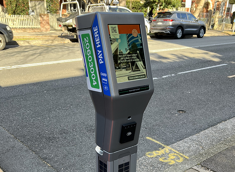 Parking meter on the side of a road
