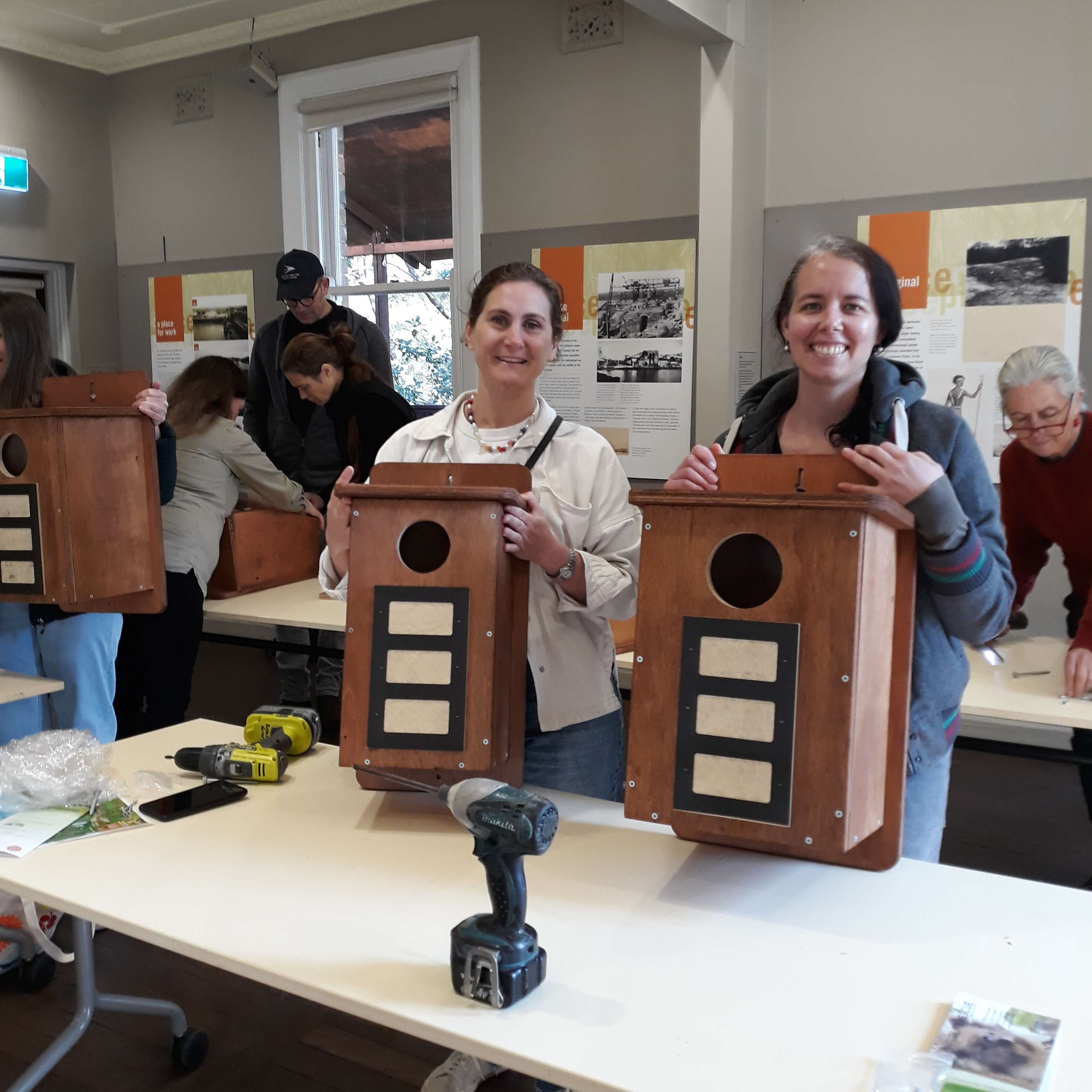 Workshop participants with prefabricated nestboxes
