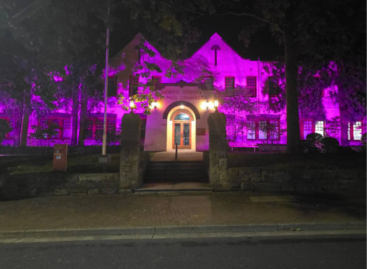 North sydney council chambers building with pink lights illuminating it