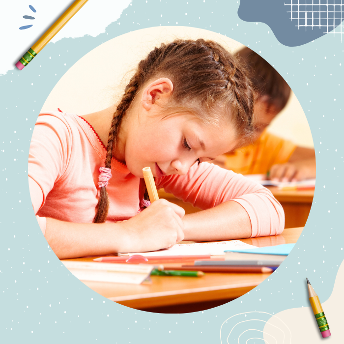 Photo of a young girl using a colour pen to draw.